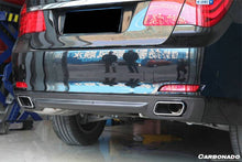 Load image into Gallery viewer, 2009-2014 BMW 7 Series F01 OEM Style Carbon Fiber Rear Lip - Carbonado