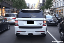 Load image into Gallery viewer, 2010-2012 Land Rover Range Rover Sport M style Mid-Exhaust Rear Lip - Carbonado Aero