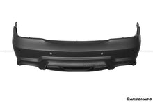 Load image into Gallery viewer, 2005-2009 Mercedes Benz W219 Cls Class WD Style Rear Bumper - Carbonado Aero
