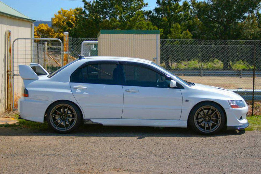2003-2006 Mitsubishi Evolution 7/8/9 RX Style Carbon Fiber Spliter - Carbonado