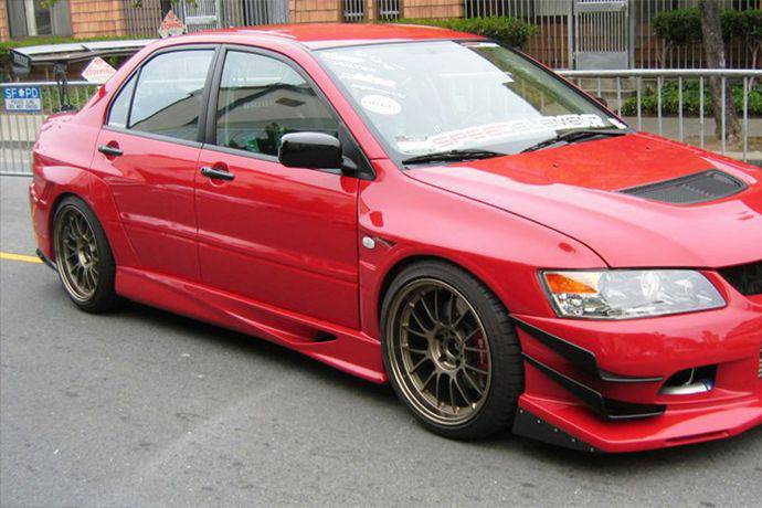 2003-2006 Mitsubishi Evolution 7/8/9 JP Style Side Skirts - Carbonado